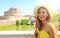 Smiling beautiful tourist girl in Rome, Italy. Attractive fashion young woman with Castel Sant Angelo castle on the background