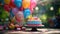 A smiling birthday cake surrounded by a of vibrant balloons,