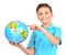 Smiling boy in casual holding globe in hands