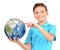 Smiling boy in casual holding planet earth in hands