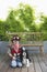 Smiling Boy In Cowboy Costume With Dog On Deck