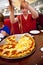 Smiling boy in a diners at night