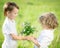 Smiling boy giving bouquet