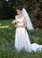 Smiling bride in bluebonnet field