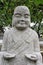 Smiling Buddha statue of natural stone, China
