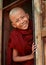 Smiling Buddhist novice
