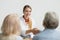 Smiling businesswoman shaking hand of senior hr at job interview