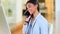 Smiling businesswoman talking on phone, networking with clients or negotiating deals. Confident and friendly