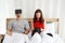 Smiling Caucasian Couplegame love relaxing with Virtual Reality glasses box on tablet in social media online game with mate.