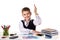 Smiling cheerful excellent pupil with hand up sitting at the table on the white background