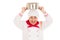 Smiling chef holding saucepan over head weraing red and white u