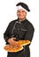 Smiling chef serving pizza