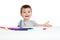 Smiling child with color felt pen over white