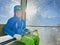 Smiling child skier admires scenery from ski resort's cable car