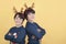 Smiling children in a Rudolph Reindeer christmas costume