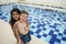 Smiling children in the swimming pool in sunny.