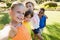 Smiling children taking selfie