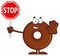 Smiling Chocolate Donut Cartoon Character Holding A Stop Sign