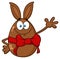 Smiling Chocolate Egg Cartoon Mascot Character With A Rabbit Ears And Red Ribbon Waving For Greeting