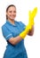 Smiling cleaning lady putting on the rubber gloves