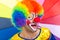 Smiling clown on a colorful background