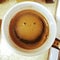 Smiling coffee face in a cup in the morning