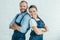 smiling confident workers in uniform posing