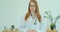 Smiling confident young adult female doctor close up portrait, friendly happy woman physician or nurse professional