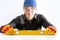 Smiling construction worker in uniform with a level tube. Construction, engineering, measurement instrument, measuring equipment,