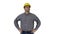 Smiling construction worker in yellow helmet looking at perfect well built object Hands on hips on white background.