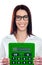 Smiling corporate lady showing green calculator