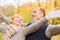 Smiling couple in autumn park