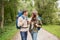 Smiling couple with backpacks hiking