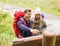 Smiling couple with backpacks hiking