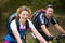 Smiling couple enjoying a bicycle ride outdoors