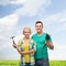 Smiling couple with hammer and drill