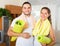 Smiling couple with towels before yoga class