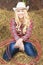 Smiling Cowgirl With Lasso Rope in Cattleshed