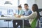 Smiling coworkers having informal meeting for discuss ideas