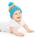 Smiling cute baby crawls in knitted hat