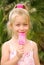 Smiling cute girl with lolly