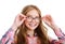 Smiling cute little girl child teen in eyeglasses education, school and vision concept