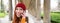 Smiling cute redhead woman makes a phone call, holds telephone near year, has mobile conversation, using smartphone on