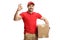 Smiling delivery man with a package gesturing a great sign