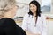 Smiling Doctor Touching Senior Patient\'s Arm Before Blood Test