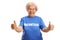 Smiling elderly female volunteer in a blue t-shirt giving thumbs up