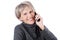 Smiling elderly woman on the telephone