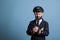 Smiling excited plane aviator in professional uniform clapping