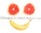 Smiling face made from grapefruit, banana and tape measure, on