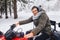 Smiling face in snow and ice after riding a snow-covered forest